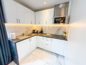 Fridge, microwave, oven, coffee/tea maker