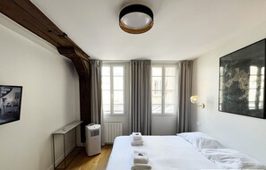 2 dormitorios, tabla de planchar con plancha, wifi gratis y ropa de cama