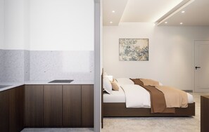 Habitación con 2 camas individuales, vista a la ciudad | Área de sala de estar | Smart TV de 27 pulgadas con canales por cable