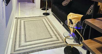 Chic 1-bedroom living room kitchen small garden. with WiFi, AC in Riyadh