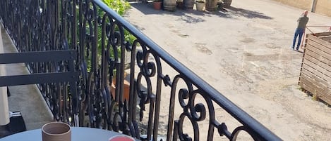 Enjoy a quiet morning on the balcony with a cup of coffee and a view of the surrounding streets.