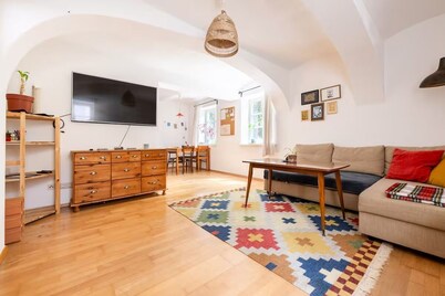 Central, quiet oasis with garden and parking lot