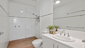 Shower, hair dryer, soap, shampoo