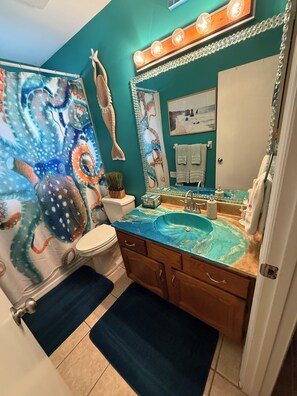 Shower, jetted tub, hair dryer, towels