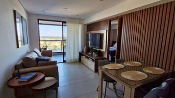 Apartamento conforto | Área de estar | Smart TV 40 polegadas com canais digitais, Netflix