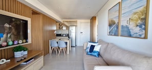 Comfort Apartment | Living area | 40-inch Smart TV with digital channels, Netflix, streaming services