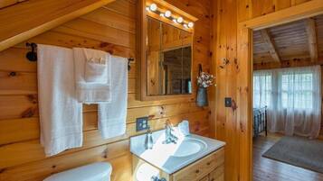Shower, jetted bath, towels, soap