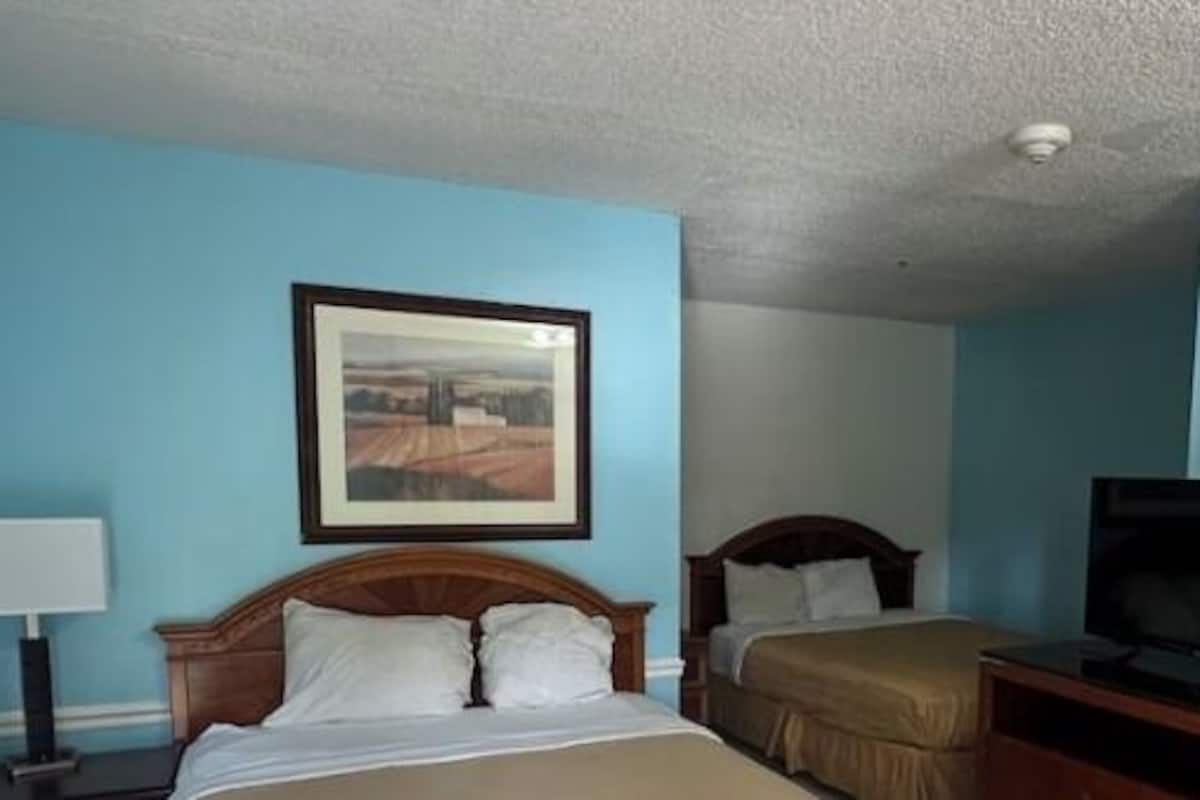 Room, 2 Queen Beds, Non Smoking, Microwave | 1 bedroom, laptop workspace, free WiFi, bed sheets