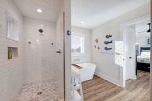 Shower, hair dryer, towels, shampoo