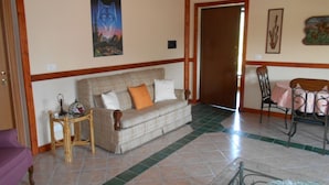 Appartement, 1 chambre, accessible aux personnes à mobilité réduite, patio | Salle à manger
