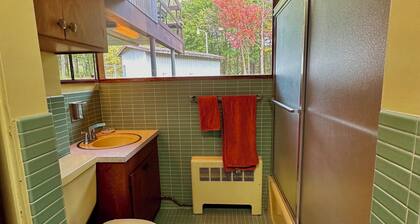 Stay in an historic 1966 deckhouse close to downtown and trails