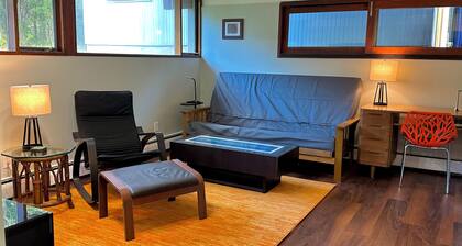 Stay in an historic 1966 deckhouse close to downtown and trails