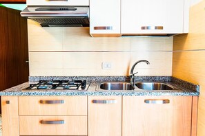 Fridge, high chair, cookware/dishes/utensils