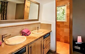 Shower, hair dryer, towels, toilet paper