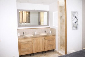 Shower, hair dryer, towels, toilet paper