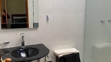 Comfort Room, Garden View | Bathroom | Shower, towels, soap, toilet paper