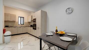 Fridge, microwave, oven, dining tables