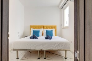 3 slaapkamers, een strijkplank/strijkijzer, beddengoed