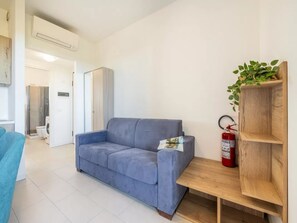 Apartment, 1 Schlafzimmer, Balkon, Meerblick | Wohnbereich
