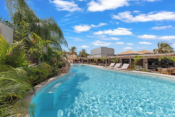 Outdoor pool, free pool cabanas, pool umbrellas