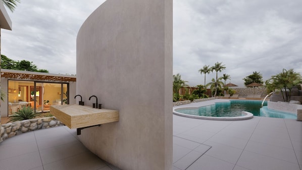 Outdoor pool, free cabanas, pool umbrellas