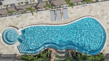 Outdoor pool, free cabanas, pool umbrellas