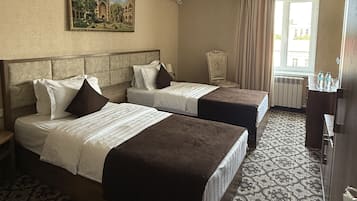 Standard Twin Room | 1 bedroom, in-room safe, desk, free WiFi