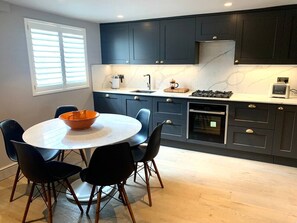 Fridge, coffee/tea maker, cookware/dishes/utensils