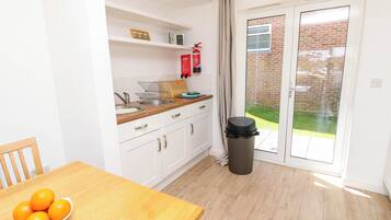 Fridge, microwave, toaster, cookware/dishes/utensils