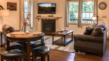 Smart TV, fireplace, books