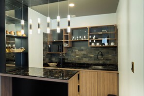 Suite Premium, balcón, vista a la ciudad | Cocina privada