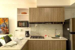 Apartment, 3 Bedrooms | Private kitchen | Fridge, coffee/tea maker, cookware/dishes/utensils - U-GO Sunset 47  (Cartagena)
