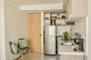 Apartment, 2 Bedrooms | Private kitchen | Coffee/tea maker, fridge, cookware/dishes/utensils - U-GO Sunset 47  (Cartagena)