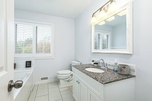 Jetted bath, hair dryer, towels, soap