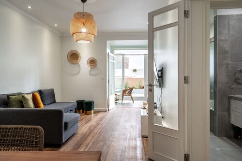 Central T2 with AC and Patio Near Av da Liberdade by Lisbeyond