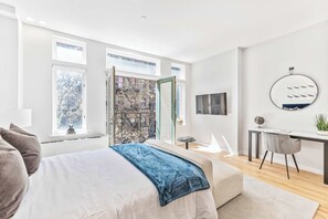 1 bedroom, desk, iron/ironing board, travel crib - Spacious Studio with Charming Juliet Balcony (New York)