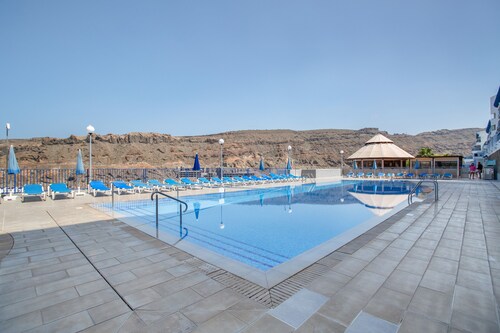 Vacation 'Taurito's Sea Sunset View' with Sea View, Shared Pool and Wi-Fi