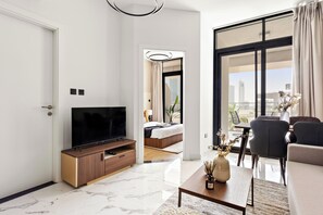 Senior Apartment | Living area | 50-inch Smart TV with digital channels