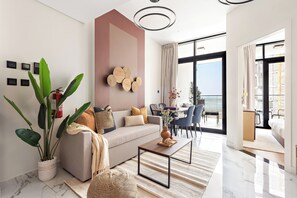 Executive Apartment | Living area | 50-inch Smart TV with digital channels