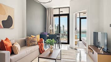 Exclusive Apartment | Ruang tamu | 50 inci sebuah televisyen pintar dengan digital