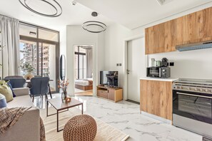Gallery Apartment | Living area | 50-inch Smart TV with digital channels