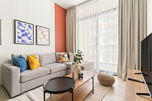 Gallery Apartment | Living area | 50-inch Smart TV with digital channels - Silkhaus Binghatti Luna (Dubai)