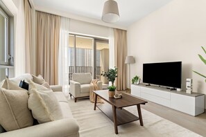 Luxury Apartment | Living area | 50-inch Smart TV with digital channels - Silkhaus Grove 3 (Dubai)