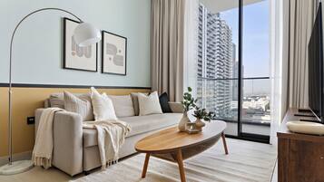 Economy Apartment | Living area | 50-inch Smart TV with digital channels