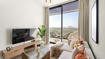 Exclusive Apartment | Living area | 50-inch Smart TV with digital channels