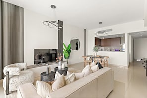 Premium Apartment | Living area | 50-inch Smart TV with digital channels