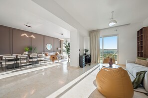 Grand Apartment | Living area | 50-inch Smart TV with digital channels - Silkhaus Marina Heights 2 (Abu Dhabi)