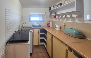 Fridge, stovetop, cookware/dishes/utensils