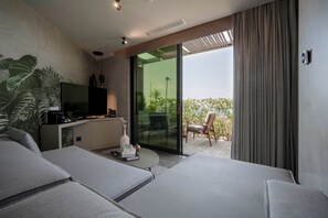 Junior Suite, Patio, Sea View | Premium bedding, minibar, free WiFi, bed sheets