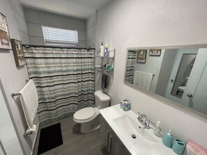 Hair dryer, towels, soap, toilet paper